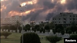 တိုက်ခိုက်ခံရပြီးနောက် မီးလောင်နေသည့် ဆော်ဒီရေနံချက်စက်ရုံ။ (စက်တင်ဘာ ၁၄၊ ၂၀၁၉)