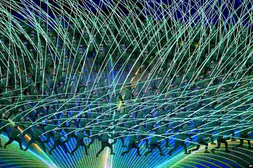 Dancers perform during the opening ceremony of the 2022 Winter Olympics, in Beijing.