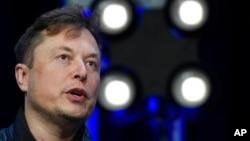 FILE - Elon Musk speaks at the SATELLITE Conference and Exhibition on March 9, 2020, in Washington.