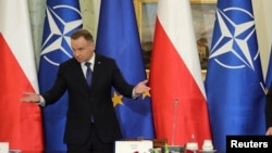 Polish President Andrzej Duda speaks during a meeting of the country's security committee in Warsaw on November 16, 2022, following an explosion on the territory of Poland the previous day. Slawomir Kaminski/Agencja Wyborcza via Reuters)