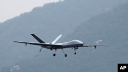 An Attack-2 drone flies during a training in Zhuhai in southern China.