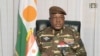 In this image taken from video provided by ORTN, Gen. Abdourahamane Tchiani makes a statement, July 28, 2023, in Niamey, Niger.