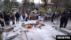 Collapsed torii gate caused by an earthquake is seen at Onohiyoshi Shrine in Kanazawa, Ishikawa prefecture, Japan, Jan. 1, 2024, in this photo released by Kyodo. 