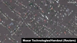 A satellite image shows the flooded town of Oleshky, Ukraine, June 7, 2023. 