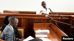 Kamanda wa ADF Kyoto Abdul Rashid anayejulikana kwa jina la "Njovu"akiwa mahakamani huko Kampala Novemba 31 2023. Picha na REUTERS/Abubaker Lubowa