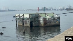 Rising sea levels due to climate change have already claimed small portions of Jakarta. Wal Adhuna Mosque is no longer used. (Dave Grunebaum/VOA)
