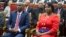 FILE - Haitian President Jovenel Moise, left, sits with his wife Martine during his swearing-in ceremony at Parliament in Port-au-Prince, Haiti, Feb. 7, 2017. Jovenel Moise was killed on July 7, 2021.