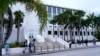 FILE - News media wait outside of the U.S. Courthouse in Fort Pierce, Florida, on July 18, 2023. U.S. District Judge Aileen Cannon has indicated that the classified-documents case against former President Donald Trump will be held there