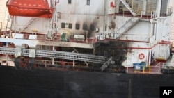 FILE - This photo shows the U.S.-owned Genco Picardy that was attacked Jan. 17, 2024, with a drone launched by Houthis in the Gulf of Aden. (Indian navy via AP)