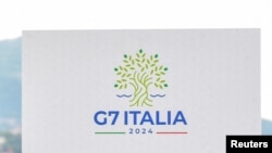 FILE - A G7 sign is seen during the group's Finance Ministers and Central Bank Governors' Meeting in Stresa, Italy, May 24, 2024. G7 leaders will hold their summit June 13-15, 2024, in Fasano, in Italy's southern Apulia region.