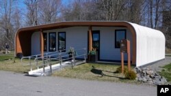 The BioHome3D is seen Tuesday, April 23, 2024, at the University of Maine, in Orono, Maine. The 600-square-foot single-family home was made by UMaine's original 3D printer in 2019. (AP Photo/Robert F. Bukaty)