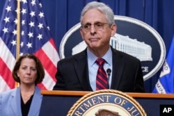 Attorney General Merrick Garland speaks at the Department of Justice in Washington, April 13, 2023.