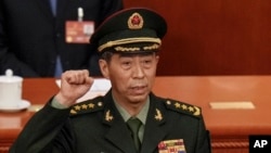 FILE - Then-Chinese Defense Minister Gen. Li Shangfu takes his oath during a session of China's National People's Congress at the Great Hall of the People in Beijing on March 12, 2023.
