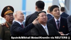 প্রেসিডেন্ট পুতিন হয়তো উত্তর কোরিয়ার উপর আরোপ করা আন্তর্জাতিক নিষেধাজ্ঞা লঙ্ঘন করতে চাইবেন না। ফাইল ফটোঃ ১৩ সেপ্টেম্বের, ২০২৩।