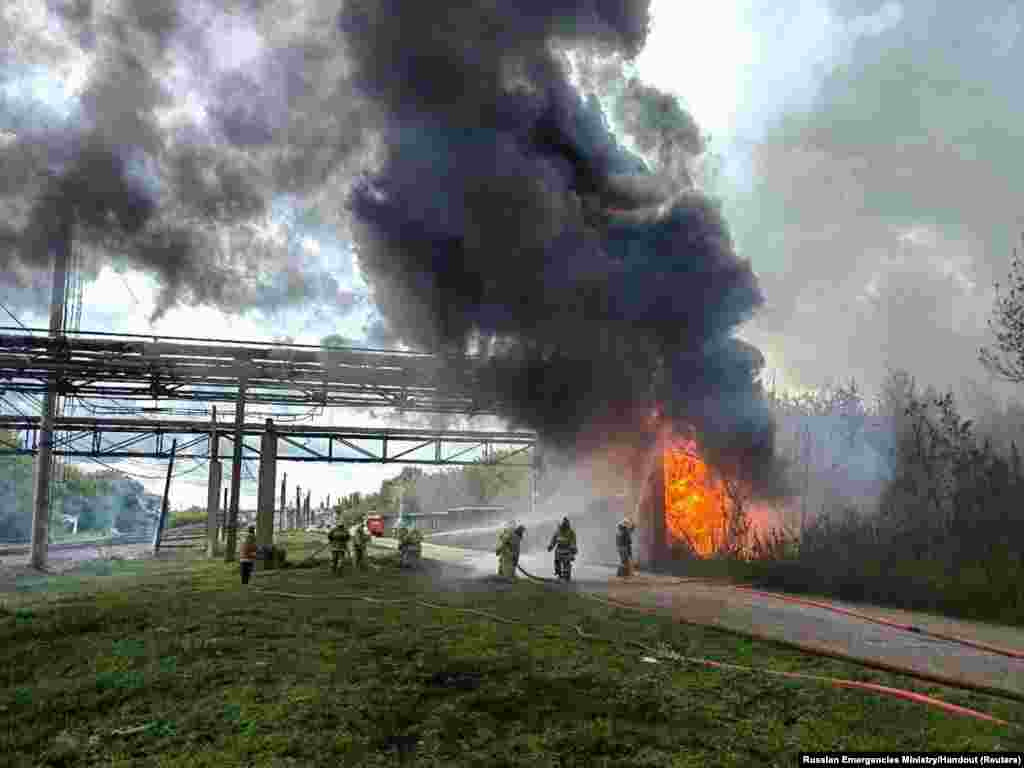 Firefighters extinguish a fire after an explosion at a fuel pipeline at the Sterlitamak petrochemical plant, in Sterlitamak in the Republic of Bashkortostan, Russia.
