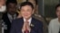 FILE - Thailand's former Prime Minister Thaksin Shinawatra arrives at Don Muang airport in Bangkok, Thailand, Aug. 22, 2023.