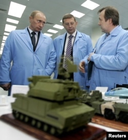 რუსეთის პრეზიდენტი პუტინი და რუსი ოლიგარქი ვლადიმერ ევტუშენკოვი