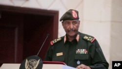 FILE - Sudan's Army chief Gen. Abdel-Fattah Burhan speaks in Khartoum, Sudan, Dec. 5, 2022.