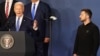 Ukraine's President Volodymyr Zelenskyy, right, listens as US President Joe Biden, center, speaks during the closing of the NATO 75th anniversary summit at the Walter E. Washington Convention Center in Washington, July 11, 2024. (Stefan Rousseau /Pool/AFP)