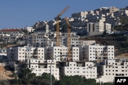 Pekerjaan konstruksi di Ramat Shlomo, sebuah pemukiman Yahudi di sektor timur Yerusalem (foto: dok). Israel terus membangun permukiman di wilayah pendudukan dan mengabaikan kecaman internasional.