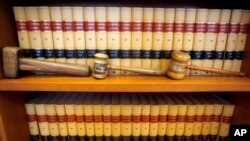FILE - Gavels and law books are shown in San Francisco, California, July 14, 2010. The Senate is trying to confirm as many judges as possible before President-elect Donald Trump takes office.