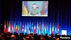 Ukrainian President Volodymyr Zelenskyy speaks via video conference speaks at the NATO Parliamentary Assembly in Copenhagen, Denmark, Oct. 9, 2023. (Ritzau Scanpix/Liselotte Sabroe/via Reuters)