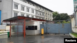 FILE - A view of a shuttered Great Wall Park compound where Cambodian authorities said they had recovered evidence of human trafficking, kidnapping and torture during raids on suspected cybercrime compounds in Sihanoukville, Sept. 21, 2022.
