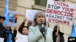 FILE - Helena Kennedy, a member of the House of Lords, speaks at a vigil in London, Feb. 13, 2023, protesting the planned visit to the U.K. of Erkin Tuniyaz, governor of the Xinjiang Uyghur Autonomous Region.