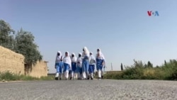 بل کلي ته په زده کړو پسې پلی مزل کوونکې د کویټې نجونه
