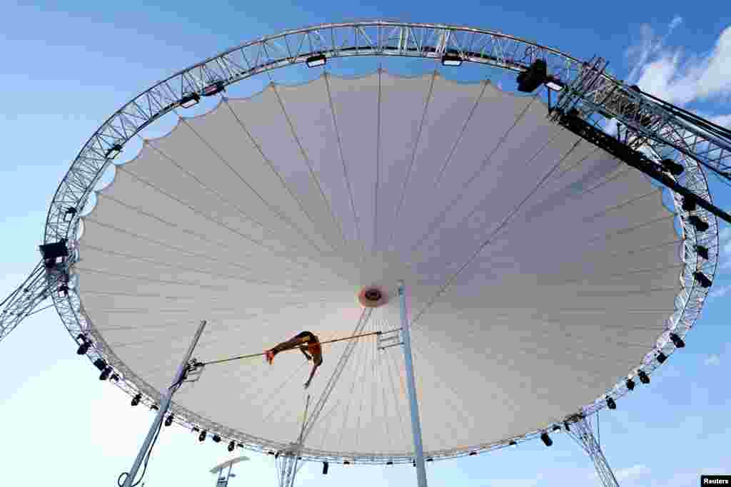 Switzerland's Valentin Imsand competes in the men's pole vault during the Athletics Diamond League in Lausanne, Switzerland.
