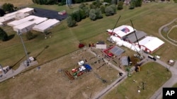 FILE - The Butler Farm Show, site of a rally for Republican Donald Trump, is seen July 15, 2024 in Butler, Pennsylvania. Trump was wounded July 13 at the rally; a shooter reportedly was atop the building farthest to the right in the cluster of buildings at left.