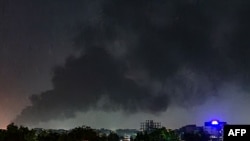 Moshi ukifuka juu ya majengo katika jiji la Khartoum tarehe 19, Mei 2023. Picha na shirika la habari la AFP. 