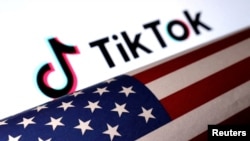 FILE - A U.S. flag is displayed alongside a TikTok logo in this illustration photo taken March 20, 2024.