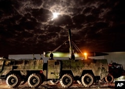 In this Xinhua News Agency photo, a Chinese missile takes part in operations during the combat readiness patrol and military exercises around the Taiwan Island on Friday, April 7, 2023. (Liu Mingsong/Xinhua via AP)