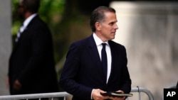 Hunter Biden departs from federal court, June 10, 2024, in Wilmington, Del. Jury deliberations continue Tuesday in his trial on federal firearms charges.