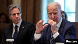 Le président américain Joen Biden (à dr.) et son secrétaire d'État Anthony Blinken.