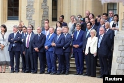 Grant Shapps, Secretary of State for Energy Security and Net Zero and U.S. Special Presidential Envoy for Climate John Kerry attend the welcome ceremony of U.S. President Biden at Windsor Castle on July 10, 2023. (Chris Jackson/Pool via Reuters)
