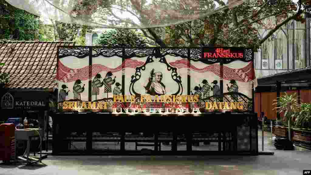 A signboard for Pope Francis is installed at the Jakarta Cathedral in Jakarta. The pontiff's 12-day trip to Indonesia, Papua New Guinea, East Timor and Singapore starts next week.