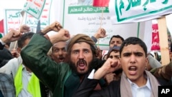 Houthi supporters attend a rally in support of the Palestinians in the Gaza Strip and against the U.S. government designating Houthis as a terror group, in Sanaa, Yemen, Jan. 19, 2024.