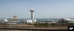 FILE - This photo taken on May 2, 2018, shows a view on the port on the shores of the Caspian Sea near Turkmenbashi city, Turkmenistan.