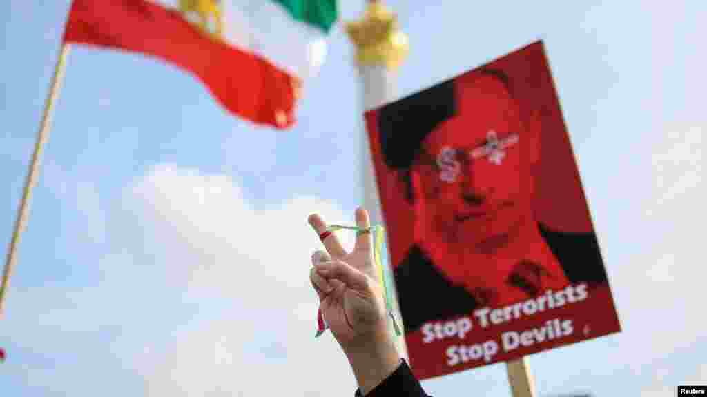 Iranians who live in Ukraine attend a protest against Iran's government and deliveries of Iranian drones to Russia amid Russia's attack on Ukraine, in central Kyiv.