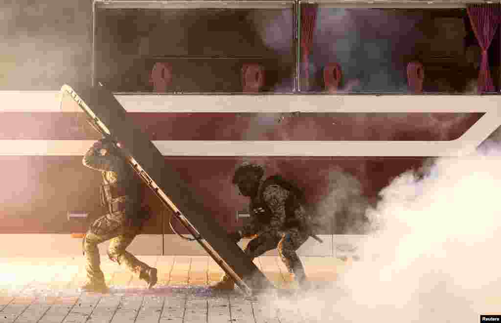 South Korea's soldiers take part in an anti-terror drill to prepare against chemical and drone attacks, at Korea International Exhibition Center in Goyang.