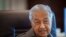 FILE - Malaysia's former Prime Minister Mahathir Mohamad speaks during an interview with The Associated Press at his office in Kuala Lumpur, Malaysia, Friday, Aug. 19, 2022.