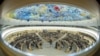 FILE - Overview of the Human Rights Council at the United Nations in Geneva, Sept. 12, 2022. Picture taken with a fish-eye lens.