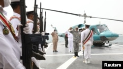 Iran's Army Chief Major General Abdolrahim Mousavi salutes before luanching drones in the Indian ocean, Iran, in this handout image obtained by Reuters on July 15, 2022.
