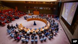 Ukrainian President Volodymyr Zelenskyy addresses the Security Council via video link during a meeting on threats to international peace and security, Aug. 24, 2022, at United Nations headquarters.