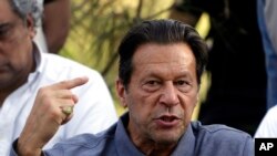FILE - Former Pakistani Prime Minister Imran Khan speaks during a news conference in Islamabad on April 23, 2022.