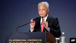 FILE - Malaysian Prime Minister Ismail Sabri Yaakob delivers a speech at a session of the International Conference on "The Future of Asia" on May 26, 2022 in Tokyo.