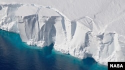 The 200-foot-tall (60-meter-tall) front of the Getz Ice Shelf in Antarctica is scored with cracks where icebergs are likely to break off, or calve, in this 2016 photo. (Credit: NASA/GSFC/OIB)