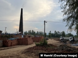 A bricklin in the middle of rice fields considered as one of the major air pollutant in Anantnag district of Kashmir.